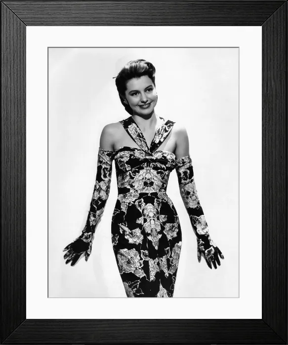 Framed Print : Cyd Charisse modeling flowered evening dress and matching gloves, ca. 1947