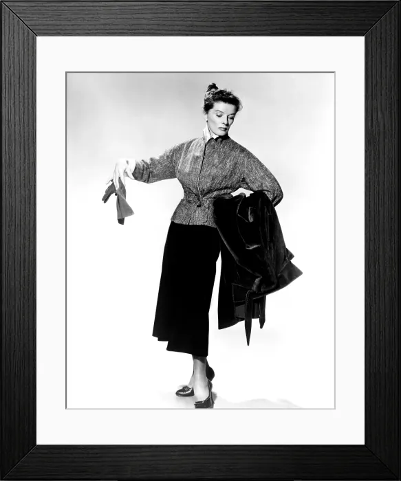 Framed Print : DESK SET, Katharine Hepburn modeling outfit, 1957. TM and Copyright (c) 20th Century Fox Film Corp. All rights reserved. Courtesy: Everett Collection Framed Print : DESK SET, Katharine Hepburn modeling outfit, 1957. TM and Copyright (c) 20th Century Fox Film Corp. All rights reserved. Courtesy: Everett Collection