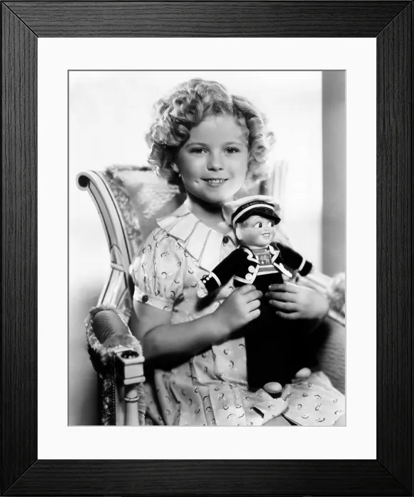 Framed Print : STOWAWAY, Shirley Temple, 1936, holding sailor doll, TM and Copyright 20th Century Fox Film Corp. All rights reserved. Courtesy: Everett Collection Framed Print : STOWAWAY, Shirley Temple, 1936, holding sailor doll, TM and Copyright 20th Century Fox Film Corp. All rights reserved. Courtesy: Everett Collection