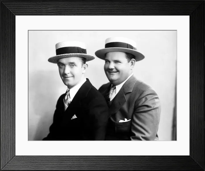 Framed Print : STAN LAUREL and OLIVER HARDY [Laurel & Hardy] in an early Hal Roach studio portrait shot, c. mid 1920s