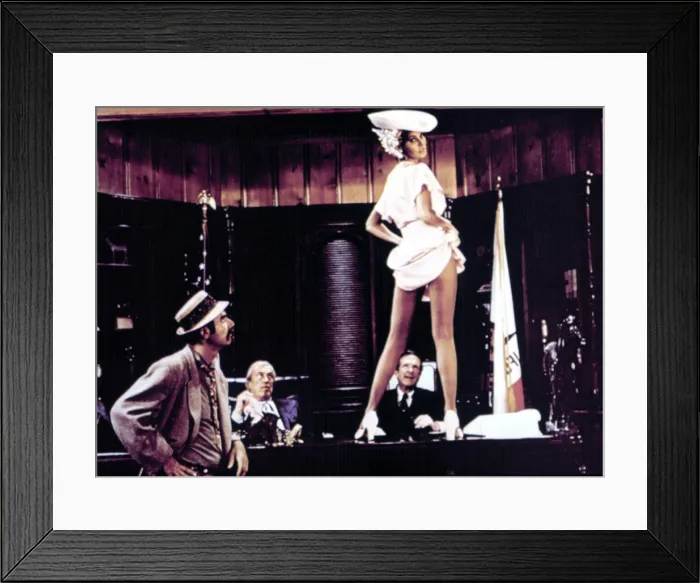 Framed Print : MYRA BRECKINRIDGE, from left: Roger C. Carmel, John Huston, Raquel Welch, Robert P. Lieb, 1970. TM and Copyright 20th Century Fox Film Corp