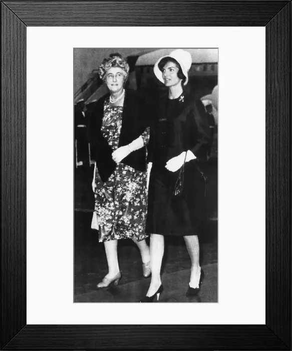 Framed Print : Lady Dorothy MacMillan, wife of British Prime Minister Harold MacMillan, and Jacqueline Kennedy, walking from the Presidential Plane after arrival to London. June 4, 1961