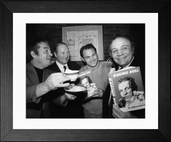 Framed Print : Rocky Graziano, Billy Graham, Carlos Ortiz, and Jake LaMotta (right), celebrate the publication of LaMotta's book. New York, November 30, 1970 Framed Print : Rocky Graziano, Billy Graham, Carlos Ortiz, and Jake LaMotta (right), celebrate the publication of LaMotta's book. New York, November 30, 1970