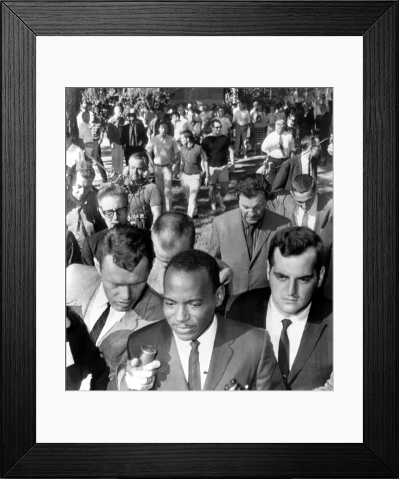 Framed Print : James Meredith, first African American ever enrolled at the University of Mississippi is trailed by reporters and U.S