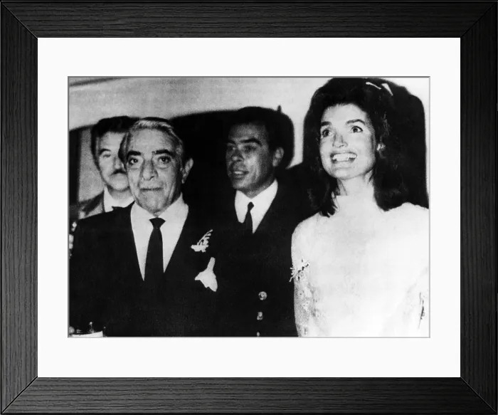 Framed Print : Aristotle Onassis (front left), former First Lady Jacqueline Kennedy Onassis (right), following their wedding on the island of Skorpios Greece, Greece. October 20, 1968 Framed Print : Aristotle Onassis (front left), former First Lady Jacqueline Kennedy Onassis (right), following their wedding on the island of Skorpios Greece, Greece. October 20, 1968