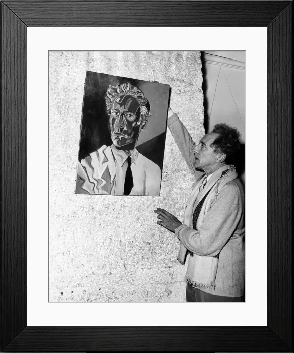 Framed Print : Jean Cocteau adjusts his self-portrait at an exhibition in Nice, France, 1953. Courtesy: CSU Archives / Everett Collection Framed Print : Jean Cocteau adjusts his self-portrait at an exhibition in Nice, France, 1953. Courtesy: CSU Archives / Everett Collection