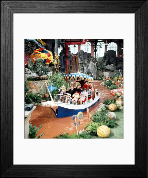 Framed Print : WILLY WONKA AND THE CHOCOLATE FACTORY, at ship's wheel: an Oompa Loompa; from left, first row, starting behind bell: Gene Wilder, Peter Ostrum, Jack Albertson, Paris Themmen