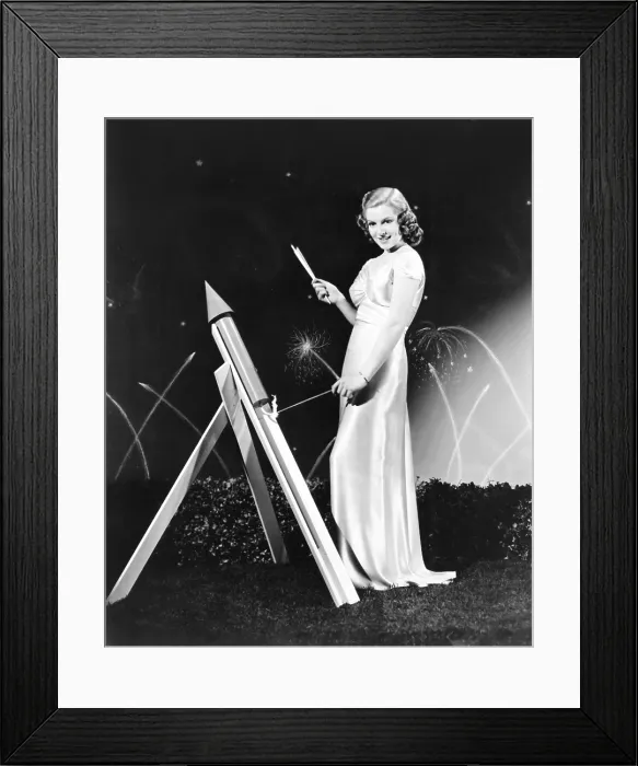 Framed Print : Lana Turner celebrates with firworks, late 1930s