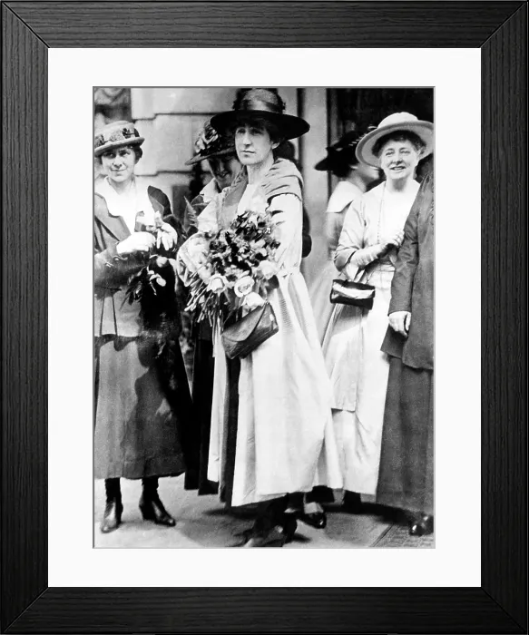 Framed Print : First female member of the U.S. House of Representatives, Jeannette Rankin (center), being honored by members of the suffragette movement, Washington D.C. c. 1910's