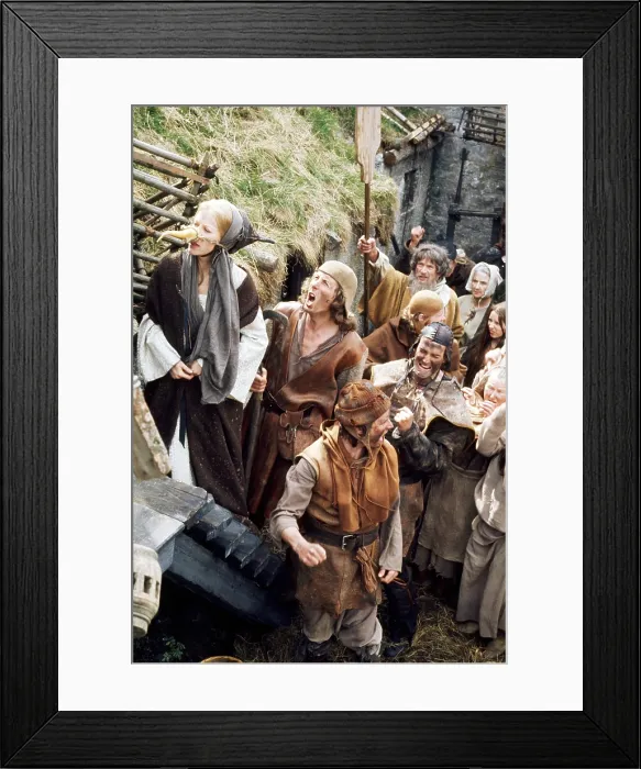 Framed Print : MONTY PYTHON AND THE HOLY GRAIL, Connie Booth (carrot nose), Eric Idle (second from left, yelling), Michael Palin (dirty, torn watchcap), John Cleese (dark leather cap)