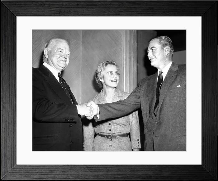 Framed Print : Former president Herbert Hoover with his son, Herbert Jr. and his wife. The previous year Hoover Jr