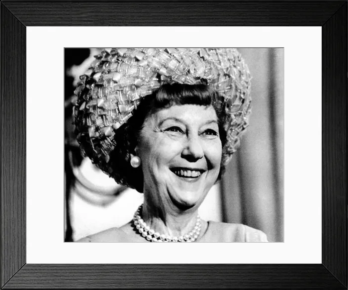 Framed Print : Mrs. Mamie Eisenhower, widow of President Dwight Eisenhower, smiles during a ceremony where President Nixon presented her with the first strike of the Eisenhower Silver Dollar Framed Print : Mrs. Mamie Eisenhower, widow of President Dwight Eisenhower, smiles during a ceremony where President Nixon presented her with the first strike of the Eisenhower Silver Dollar