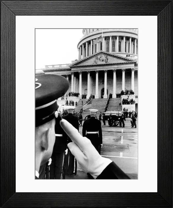 Framed Print : President Eisenhower's funeral. An honor guard salutes as the horse-drawn caisson carrying the coffin of Gen. Eisenhower arrives at the Capitol. March 30, 1969