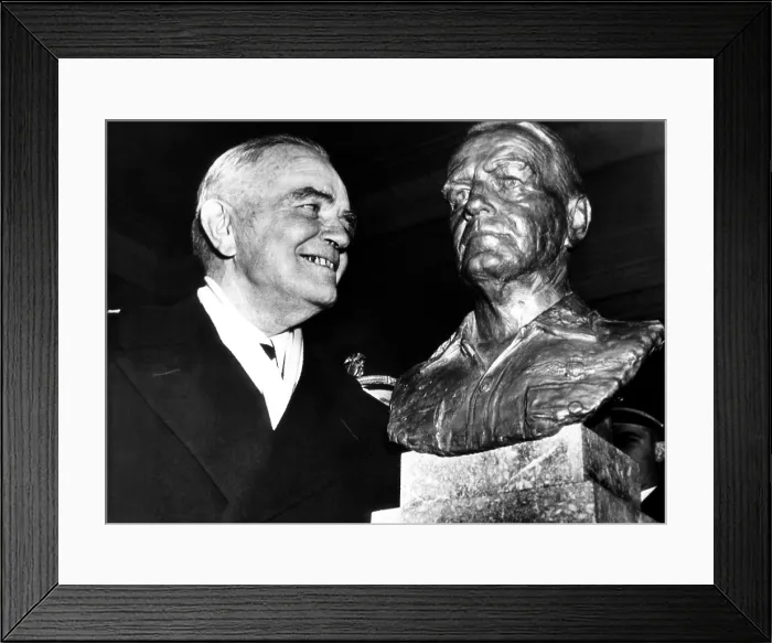 Framed Print : Admiral William F. Halsey looks over a bust of himself during Halsey Day ceremonies at the US Naval Acadey in Annapolis, Maryland. December 14, 1947