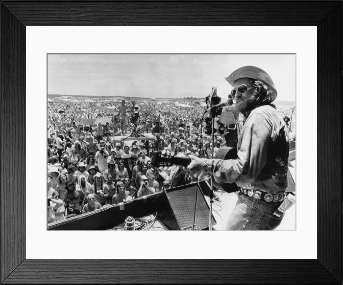 Framed Print : Country rock singer Willie Nelson opening the July 4th Picnic music festival, 1974.. Courtesy: CSU Archives  /  Everett Collection
