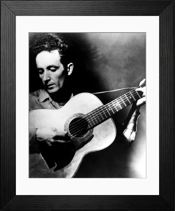 Framed Print : Folk singer Woody Guthrie, ca.1950s. Courtesy CSU Archives / Everett Collection Framed Print : Folk singer Woody Guthrie, ca.1950s. Courtesy CSU Archives / Everett Collection