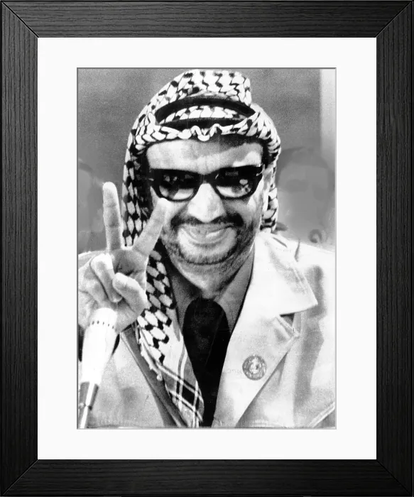 Framed Print : Yasser Arafat flashes victory sign at the final session of the Seventh Arab Summit Conference, Rabat, Morocco, 10-29-1974.. Courtesy: CSU Archives  /  Everett Collection