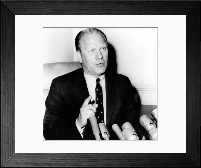 Framed Print : Congressman Gerld R. Ford at a press conference defending the U.S. bombing of missile bases in North Vietnam, July 7, 1965. Courtesy: CSU Archives  /  Everett Collection