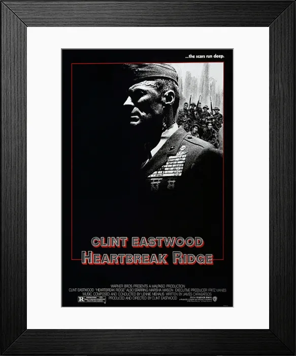 Framed Print : HEARTBREAK RIDGE, US poster, Clint Eastwood, 1986. Warner Bros. Pictures / courtesy Everett Collection Framed Print : HEARTBREAK RIDGE, US poster, Clint Eastwood, 1986. Warner Bros. Pictures / courtesy Everett Collection
