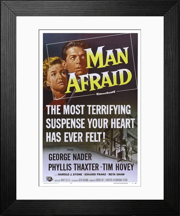Framed Print : MAN AFRAID, US poster art, from left: Phyllis Thaxter, George Nader, 1957 Framed Print : MAN AFRAID, US poster art, from left: Phyllis Thaxter, George Nader, 1957