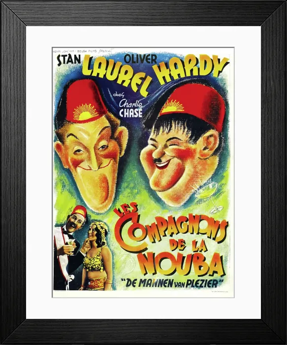 Framed Print : SONS OF THE DESERT, top l-r: Stan Laurel, Oliver Hardy, bottom l-r: Charley Chase on Belgian poster art, 1933 Framed Print : SONS OF THE DESERT, top l-r: Stan Laurel, Oliver Hardy, bottom l-r: Charley Chase on Belgian poster art, 1933