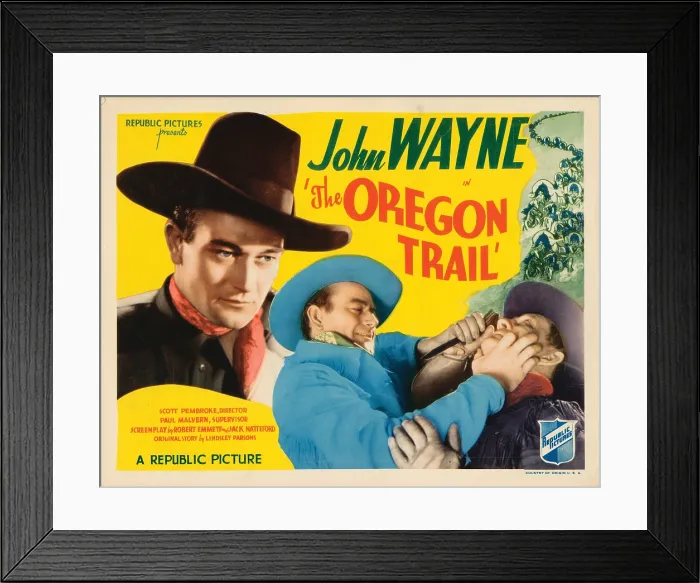 Framed Print : THE OREGON TRAIL, lobbycard, John Wayne (left and center), Harry Harvey (right), 1936