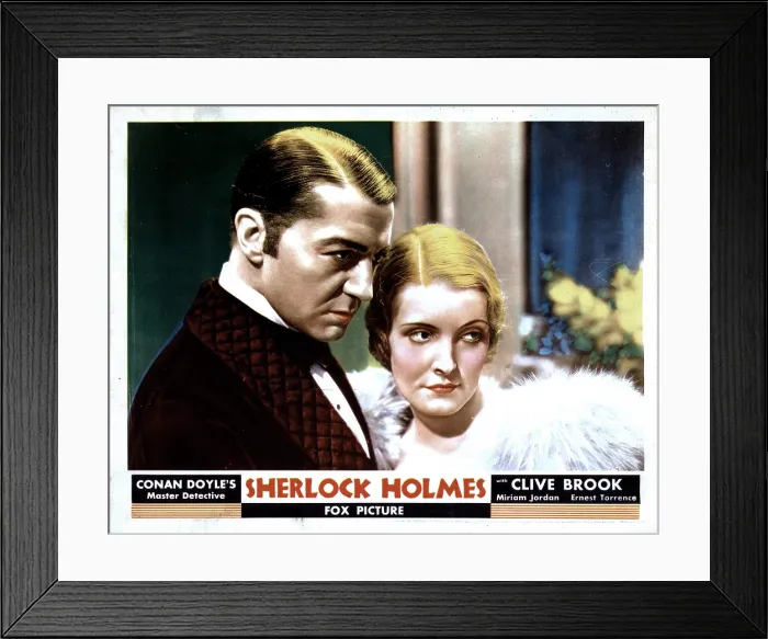 Framed Print : SHERLOCK HOLMES, from left, Clive Brook, Miriam Jordan, 1932, TM & Copyright 20th Century Fox. All rights reserved / Courtesy Everett Collection