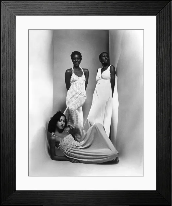 Framed Print : Three models sport maxi-dresses with empire waistlines, 1973.. Courtesy: CSU Archives  /  Everett Collection