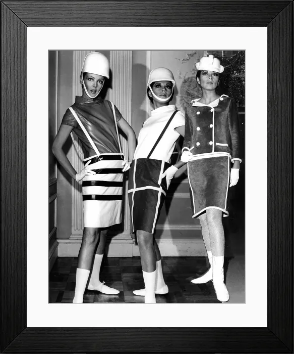 Framed Print : Leather barrel-shaped skirts with suspenders and cowl necked blouses designed by Andre Courreges, 1965. Photo: CSU / Everett Collection Framed Print : Leather barrel-shaped skirts with suspenders and cowl necked blouses designed by Andre Courreges, 1965. Photo: CSU / Everett Collection