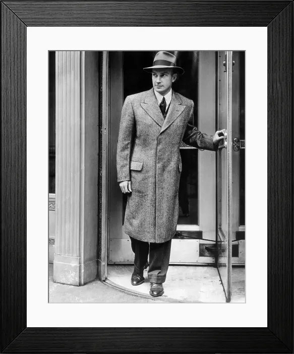 Framed Print : A man models a new topcoat for spring, March, 1939. Photo: Courtesy: CSU Archives / Everett Collection