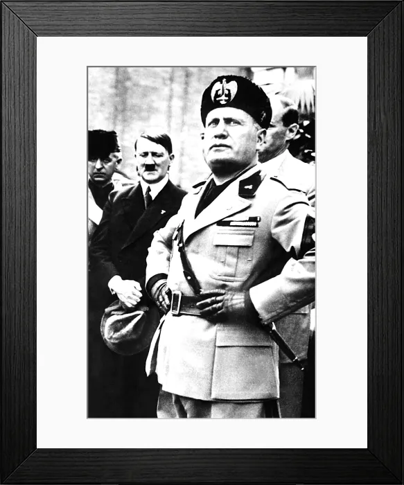 Framed Print : BENITO MUSSOLINI, with ADOLF HITLER standing to his side, c. 1940. Courtesy: CSU Archives / Everett Collection Framed Print : BENITO MUSSOLINI, with ADOLF HITLER standing to his side, c. 1940. Courtesy: CSU Archives / Everett Collection