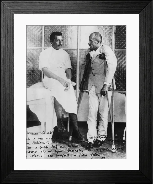 Framed Print : Benito Mussolini (right), Prime Minister and dictator of Italy from 1922-1943, hospitalized for wounds received in action. He is being treated by Dr
