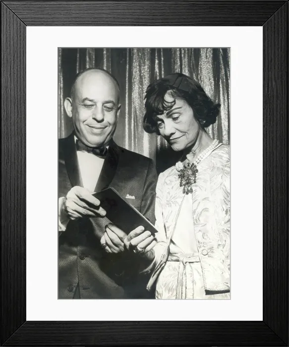 Framed Print : GABRIELLE COCO CHANEL, being presented the Neiman-Marcus fashion award for 1957 by Stanley Marcus during the awards banquet in the Statler-Hilton hotel in Dallas, Texas Framed Print : GABRIELLE COCO CHANEL, being presented the Neiman-Marcus fashion award for 1957 by Stanley Marcus during the awards banquet in the Statler-Hilton hotel in Dallas, Texas