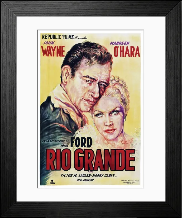 Framed Print : RIO GRANDE, from left: John Wayne, Maureen O'Hara featured on Spanish poster art, 1950 Framed Print : RIO GRANDE, from left: John Wayne, Maureen O'Hara featured on Spanish poster art, 1950