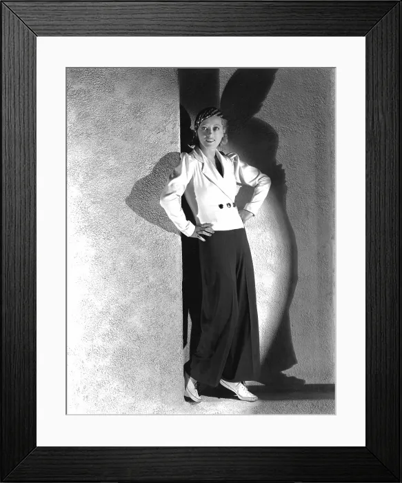Framed Print : Marion Davies, modeling a blue and white trouser suit of flannel, 1933