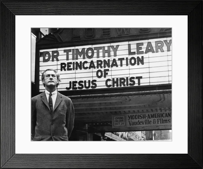 Framed Print : Timothy Leary (1920-1996), outside Village Theatre in New York. presenting his celebration #2 titled THE REINCARNATIONS OF JESUS CHRIST'. May 28, 1966
