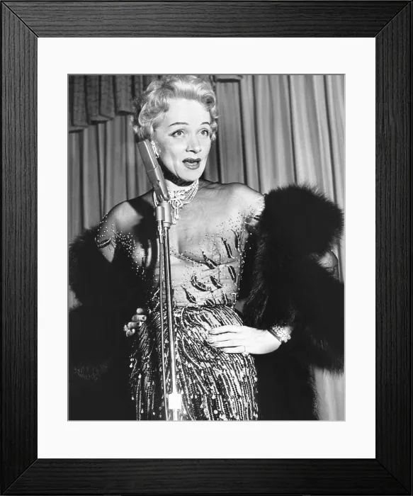 Framed Print : Marlene Dietrich, (in a dress by Jean Louis) in concert at the Sahara Hotel's Congo Room, December 1953 Framed Print : Marlene Dietrich, (in a dress by Jean Louis) in concert at the Sahara Hotel's Congo Room, December 1953