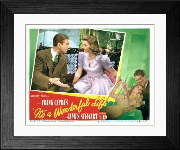 Framed Print : IT'S A WONDERFUL LIFE, US lobbycard, from left: James Stewart, Donna Reed, 1946