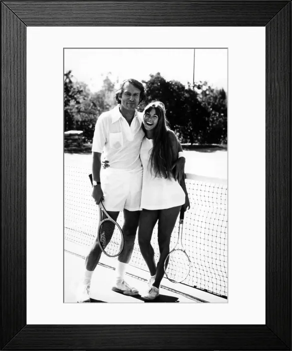Framed Print : Hugh Hefner and Barbi Benton pose for a cover shot for Tennis Magazine'. ca 1972. Courtesy CSU Archives / Everett Collection Framed Print : Hugh Hefner and Barbi Benton pose for a cover shot for Tennis Magazine'. ca 1972. Courtesy CSU Archives / Everett Collection