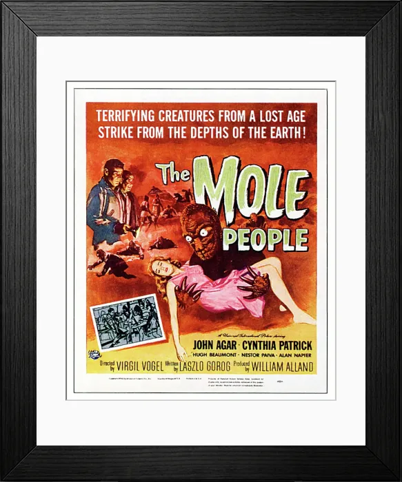 Framed Print : THE MOLE PEOPLE, upper left, with flashlight: Hugh Beaumont; girl in pink dress, center: Cynthia Patrick; window card poster art, 1956 Framed Print : THE MOLE PEOPLE, upper left, with flashlight: Hugh Beaumont; girl in pink dress, center: Cynthia Patrick; window card poster art, 1956