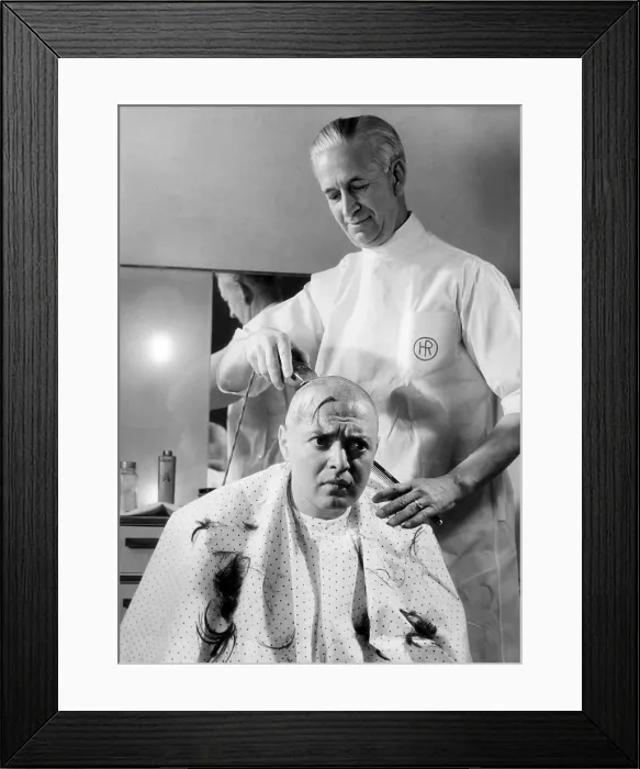 Framed Print : MAD LOVE, Peter Lorre getting his head shaved for upcoming role, 1935