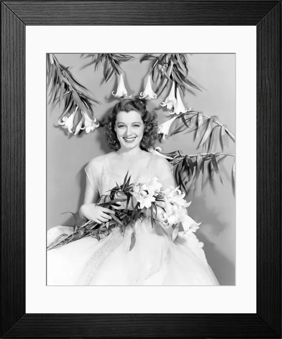 Framed Print : Ellen Drew, celebrating Easter with lilies, 1940