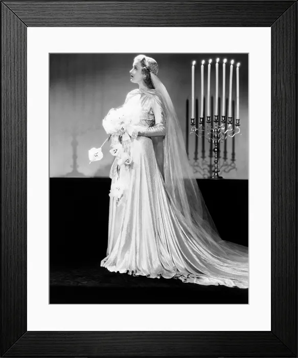 Framed Print : Paramount starlet Ellen Drew, modeling the latest in wedding fashions, by Edith Head, 1939