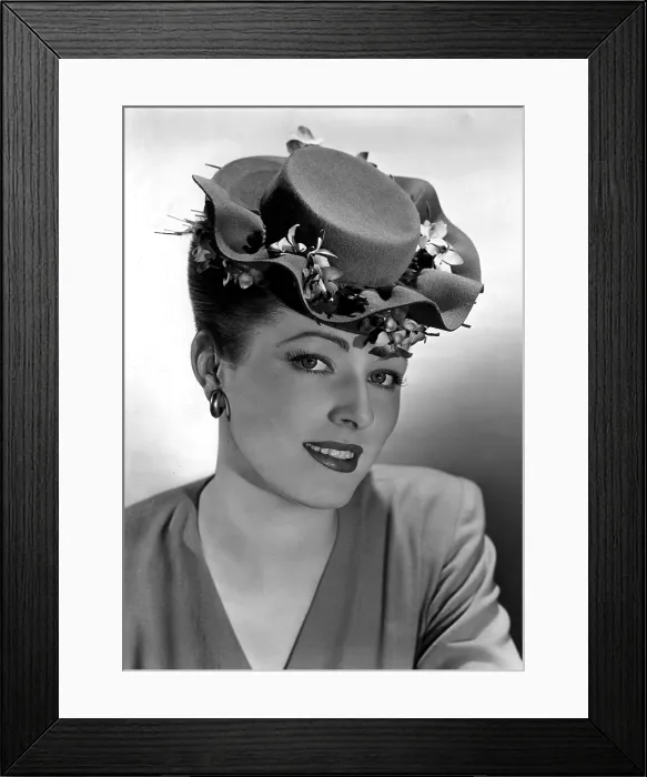 Framed Print : ELEANOR PARKER, wearing a flat-crowned, double-brimmed hat nestled with violets, 1944 Framed Print : ELEANOR PARKER, wearing a flat-crowned, double-brimmed hat nestled with violets, 1944