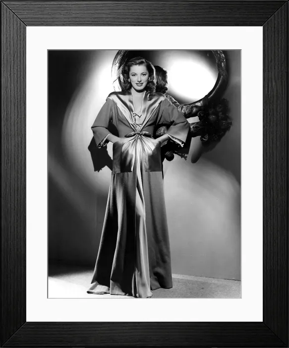 Framed Print : ELEANOR PARKER in a semi-tailored negligee designed by Leah Rhodes, 1946