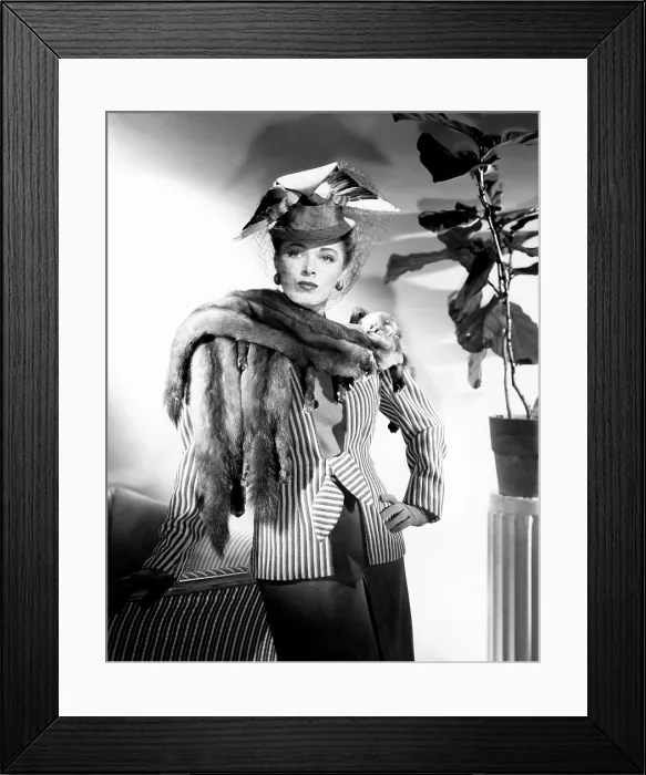 Framed Print : Eleanor Parker, modeling a brown and pink ensemble with a sable scarf, 1945 Framed Print : Eleanor Parker, modeling a brown and pink ensemble with a sable scarf, 1945
