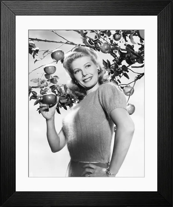Framed Print : Irene Manning, who has just been named the Pippin Girl by the Washington State Apple Growers Association, ca. mid-1940s