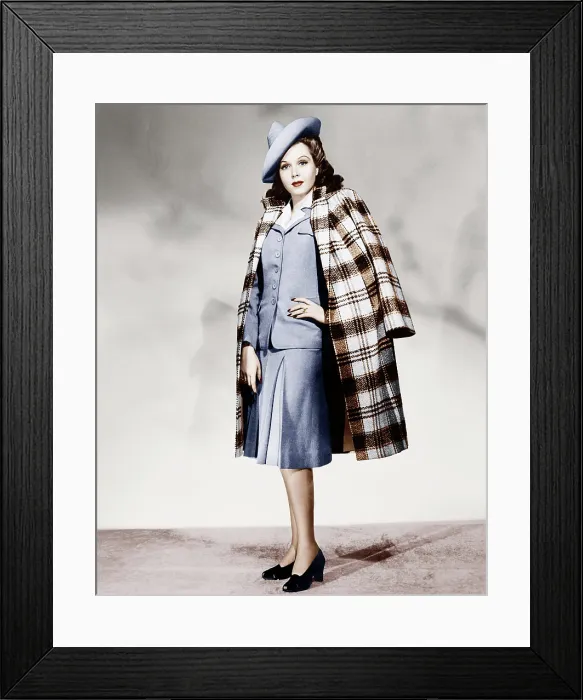 Framed Print : Ann Miller wearing light blue skirt suit and plaid overcoat, 1941 Framed Print : Ann Miller wearing light blue skirt suit and plaid overcoat, 1941