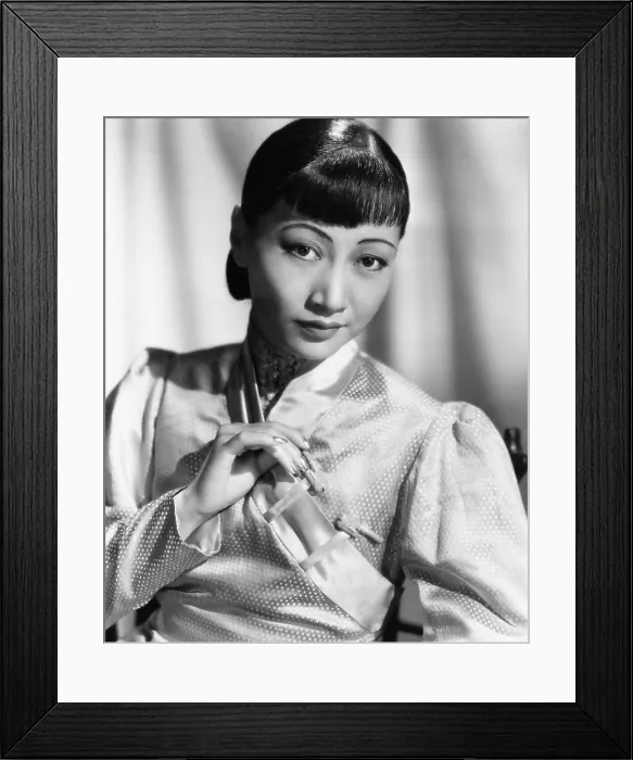 Framed Print : Anna May Wong, in an orange Nanking brocade robe with sandalwood fastenings, 1937