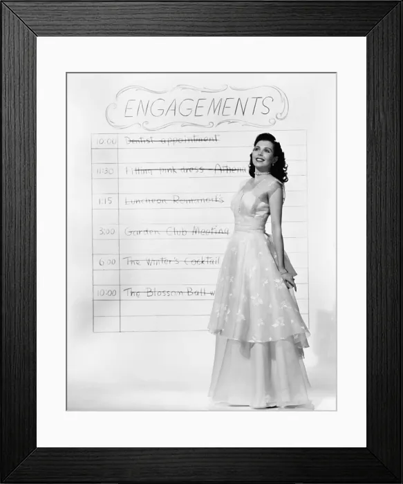 Framed Print : Ann Miller, checking off her to-do list, 1948 Framed Print : Ann Miller, checking off her to-do list, 1948